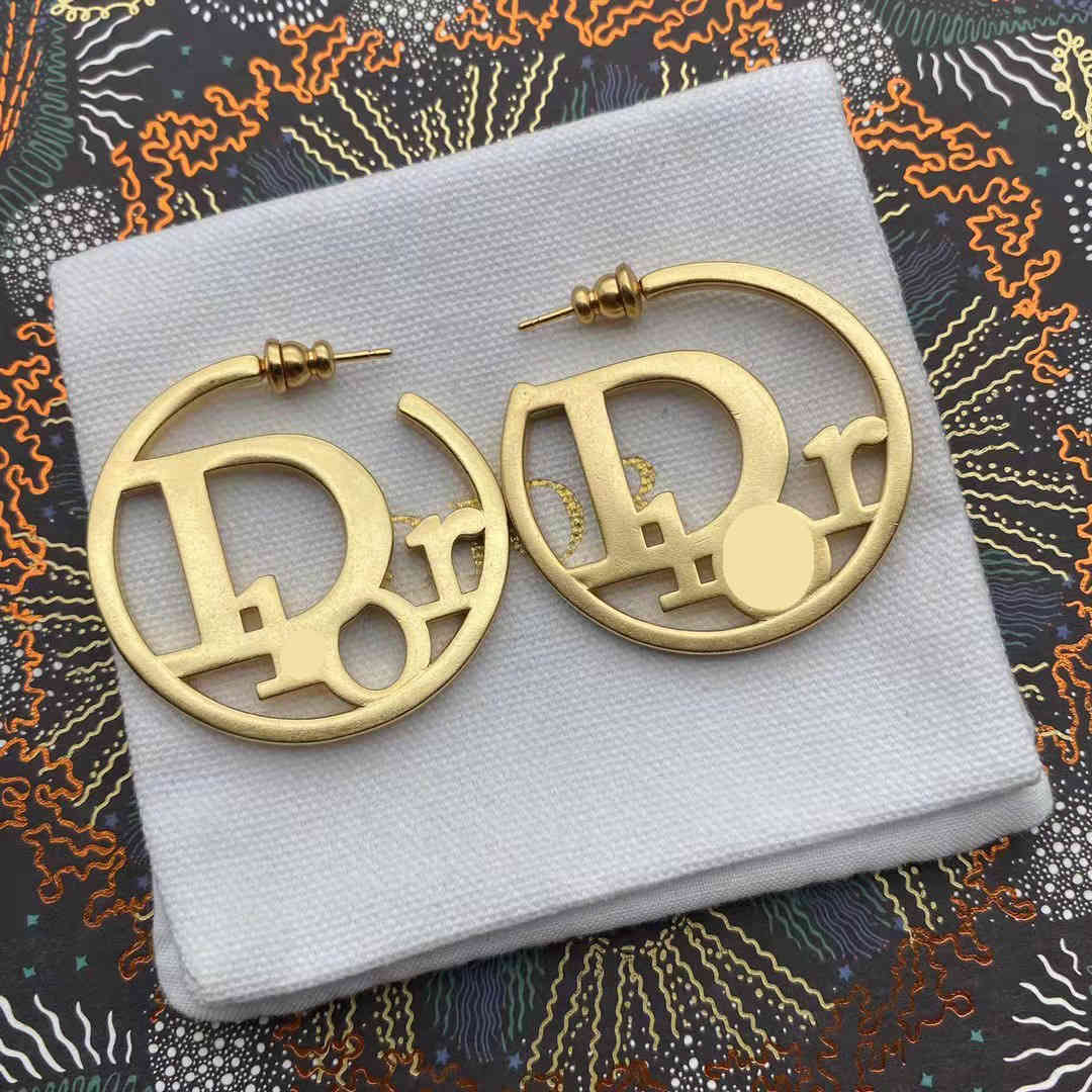 

Luxury Brand Earrings D home / Dijia 2021 new CD letter female hollow out simple and small circle