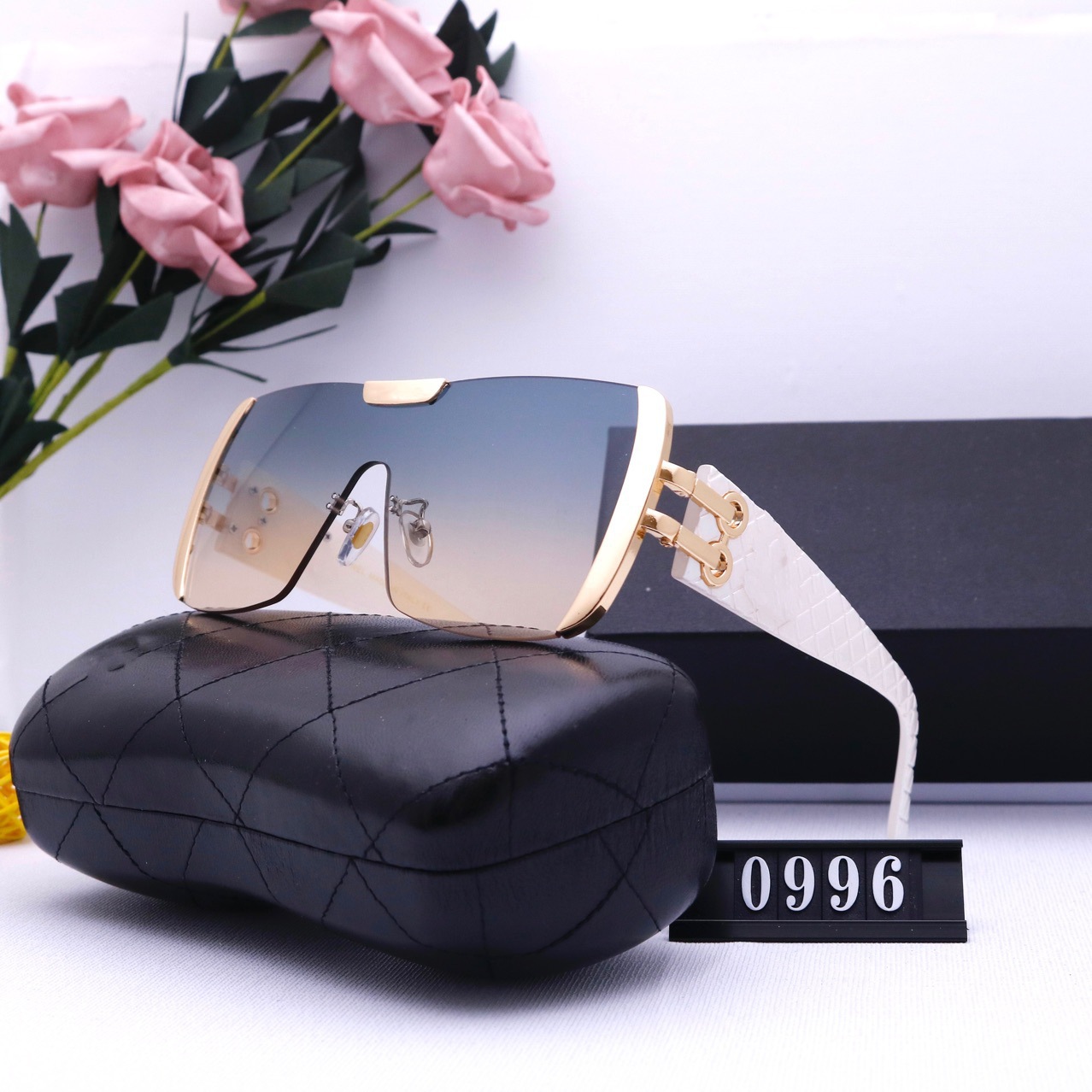 

2021 new men's and women's sunglasses driving trimming conjoined foreign trade European American tide ocean glasses 0996 with box