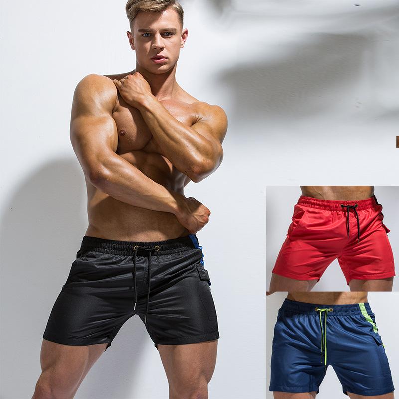 

Gym Clothing 2021 Men's Leisure Pajamas Sports Shorts Solid Color Pocket Large Size Loose Quick-Drying Beach Pants, Black