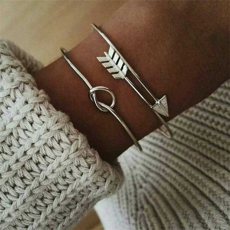 

Haimaitong Gold Color Open Arrow Knotted Charms Bracelet Jewelry Valentines Gift Vintage Cuff Bracelet for Women Brief Q0719