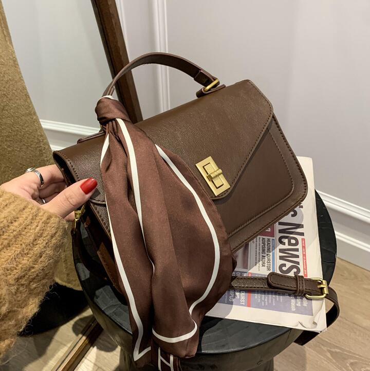 

Factory wholesale women handbag simple retro postman bag elegant atmosphere leather shoulder bags Joker Ribbons fashion handbags
