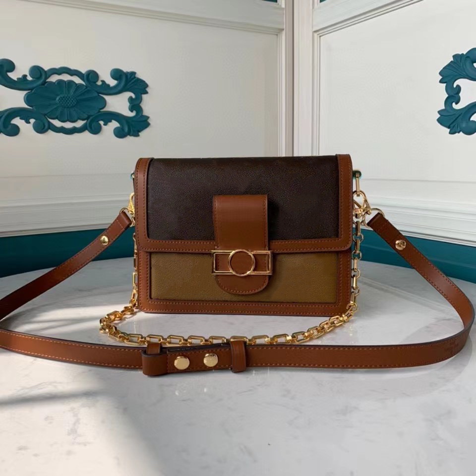 

Woman Cross body bag Nicolas Ghesquière Dauphine Reverse canvas plus features like a chain strap and magnetized lock, Order with bag