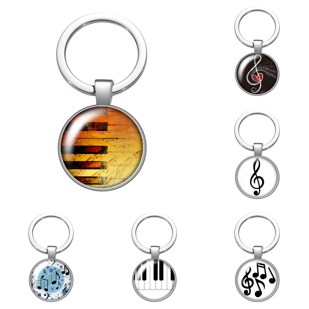

Music Note Musical Instruments Glass Cabochon Keychain Bag Car Key Chain Ring Holder Silver Color Keychains for Men Women Gifts