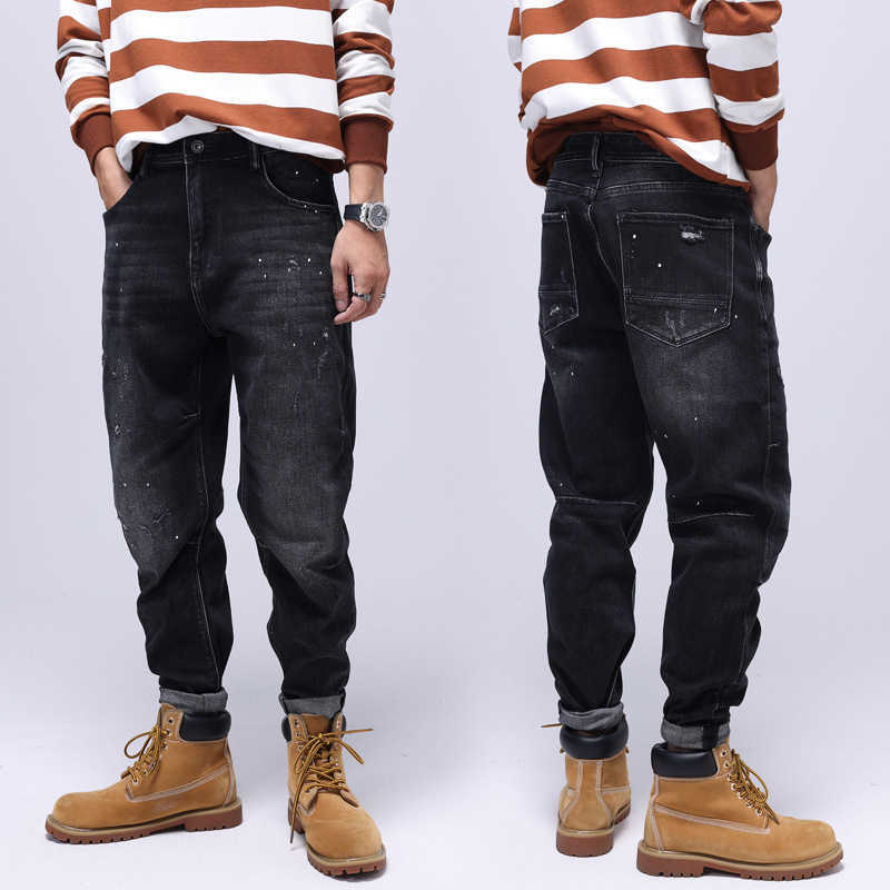 

Street Style Fashion Men Jeans Black Elastic Loose Fit Ripped Spliced Painted Designer Hip Hop Splashed Denim Pants