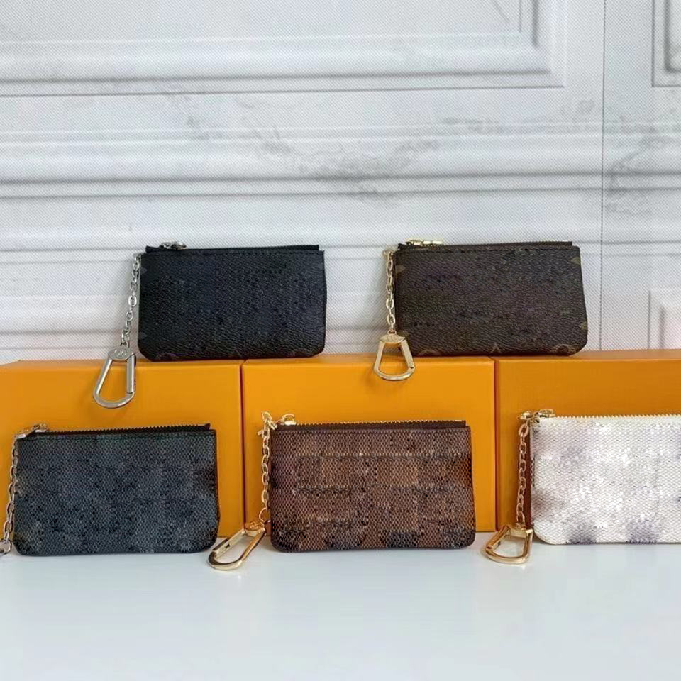 

Fashion Luxurys Designers France style coin pouch men women lady leather purse key wallet mini wallets Credit Card serial number M62650, Customized