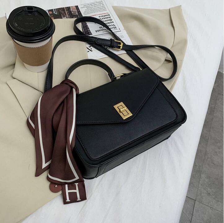 

Factory wholesale women handbag simple retro postman bag elegant atmosphere leather shoulder bags Joker Ribbons fashion handbags