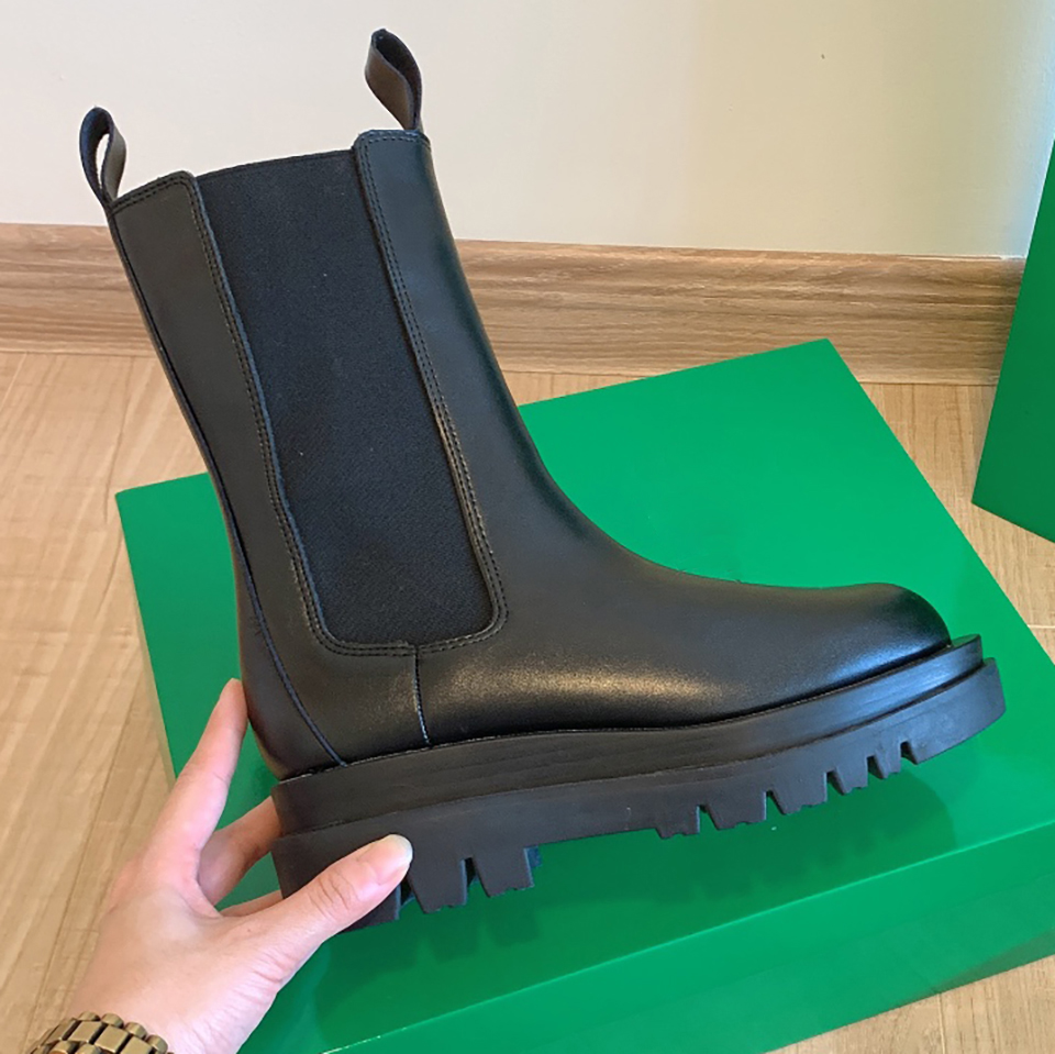 

Women's designer LUG boot black leather round toe rubber platform ankle boots