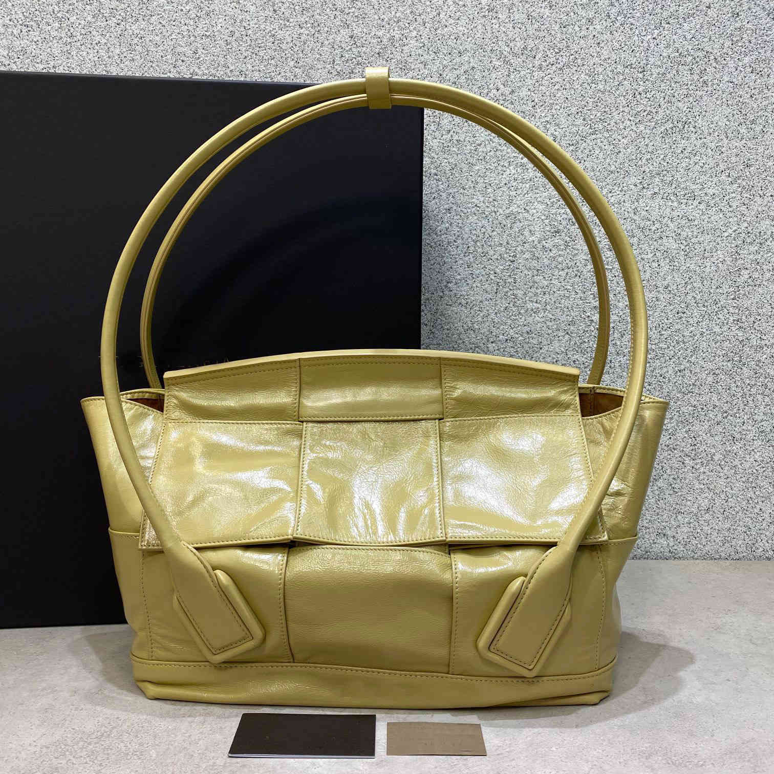

Trend weaving crossbow catfish smile face cow 2021 summer new leather women's Arco wing bag