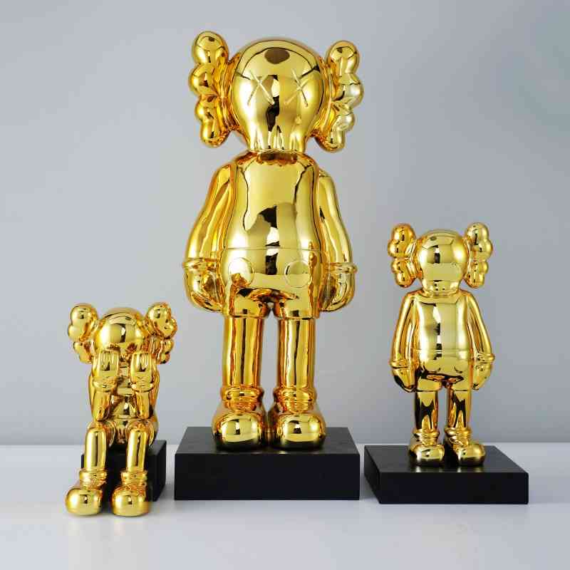 

Nordic modern model is decorated with golden figures, TV cabinet ornaments, home living room and study handicrafts