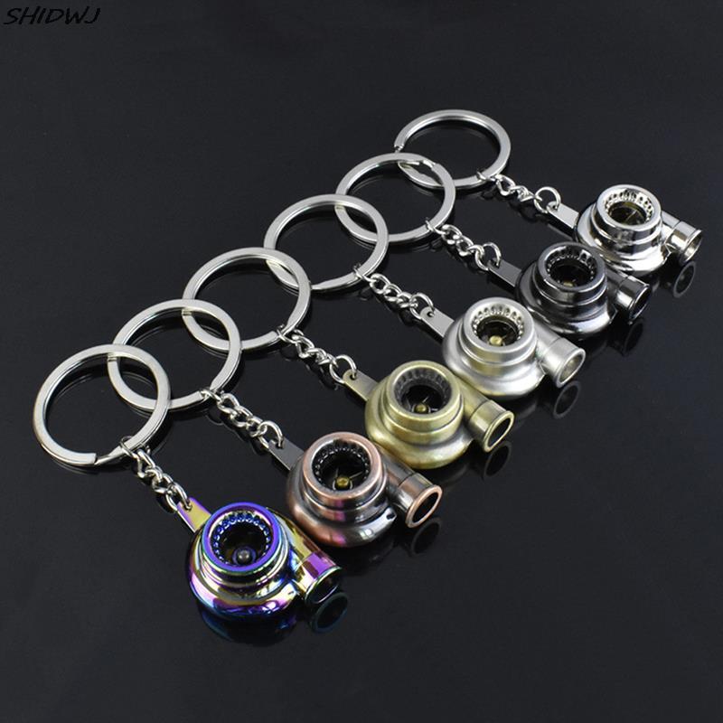 

Keychains 1PC 7 Colors Mini Turbo Turbocharger Keychain Spinning Turbine Keyring Chain Ring Keyfob Car Interior Accessories