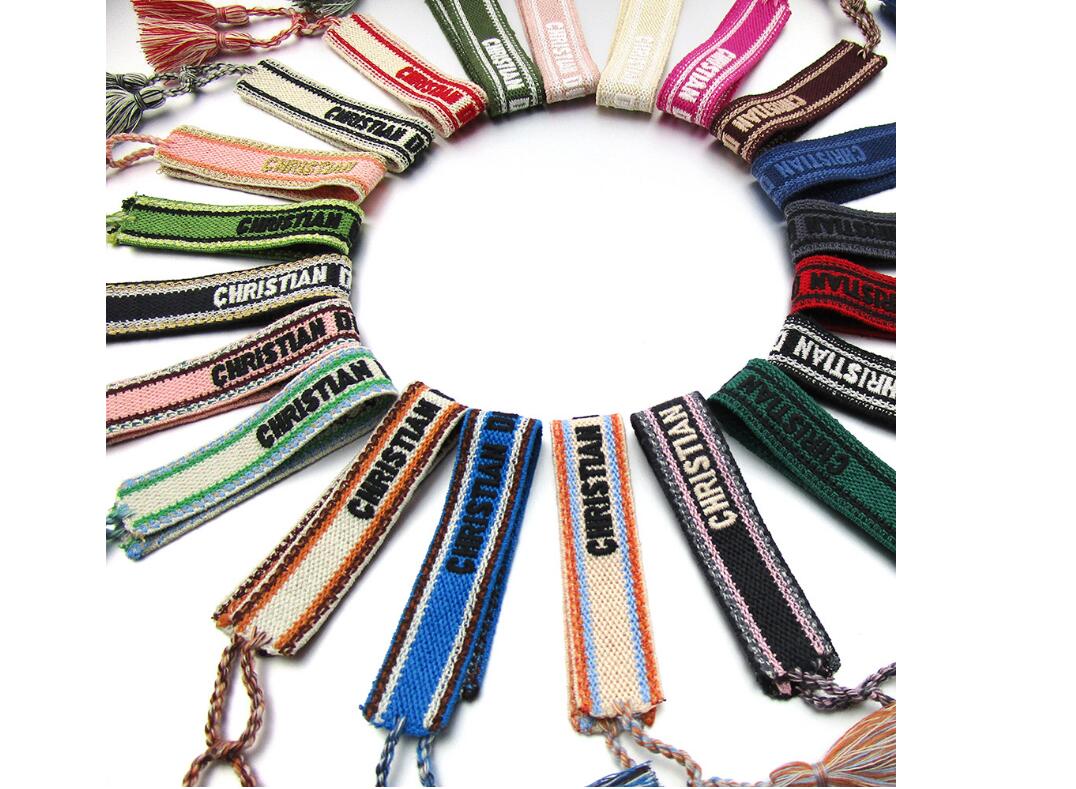 

Luxury style strand rope material woven bracelet with sewing words and tassel hand strap brand jewelry for women gift 7z66