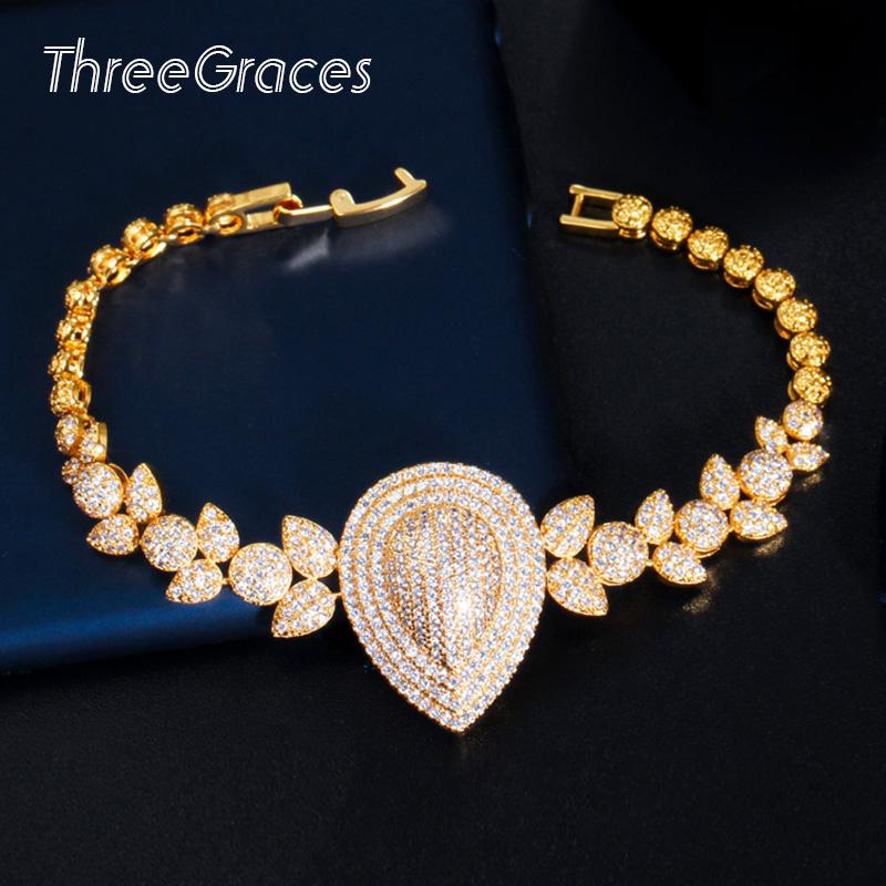 

Charm Bracelets ThreeGraces Luxury Cubic Zircon Stone Tear Drop Shape Yellow Gold Color Bride Bangle Fashion Wedding Jewelry BR121, Golden;silver