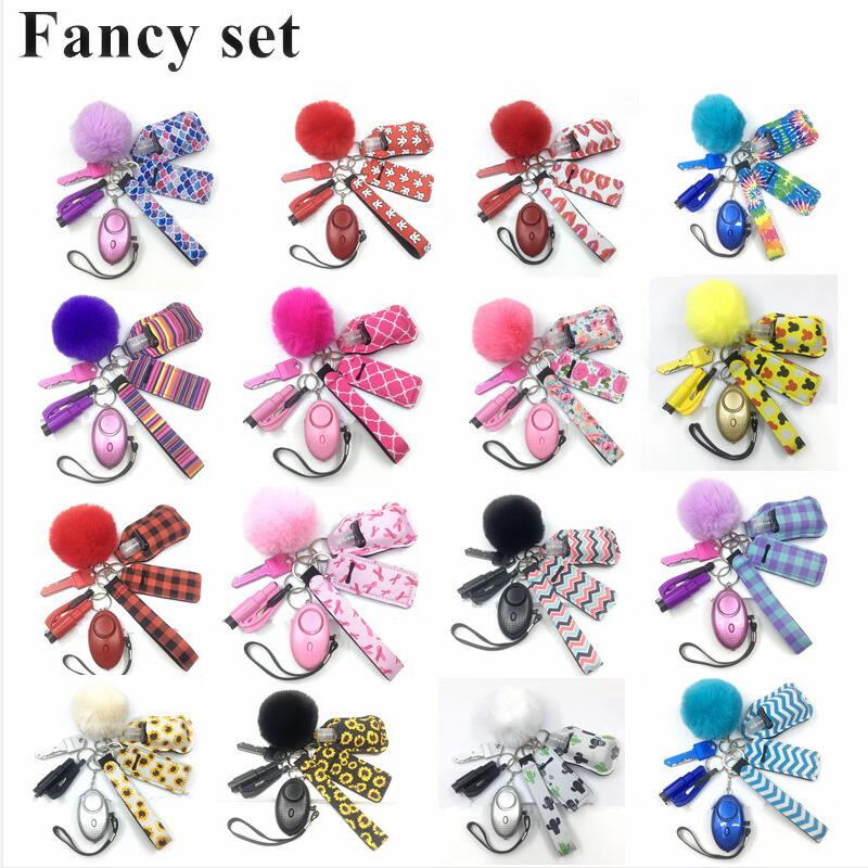 

Self Defense Keychain Set Pendants Alarm Pompom Hand Sanitizer Wrist strap Lipstick Keychains Opener Whistle For Woman Men Self-keychain