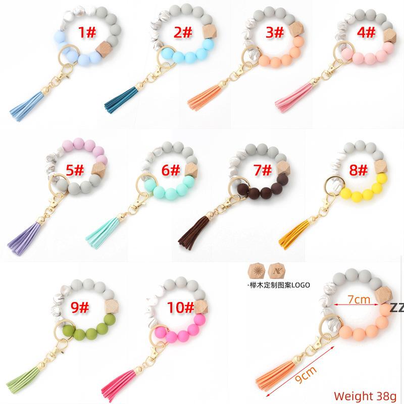 

Party Favor Keychain Wooden Tassel String Chain Food Grade Silicone Bead Women Girl Key Ring Wrist Strap Bracelet HWE7128