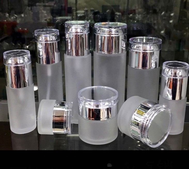 

Empty Refillable Frosted Glass Pump Spray Bottle Ideal for Lotion Essential Oil, Cream Jars Travel Small Container with Bright Silver Lid