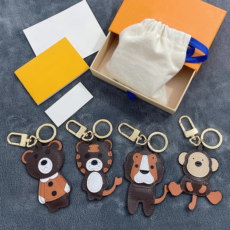 

Fashion Buckle Lovers Keychain Designer Handmade Leather Key Chains Men Car Keychains Women Luxury Accessories Tiger Lion Monkey Bear ACC