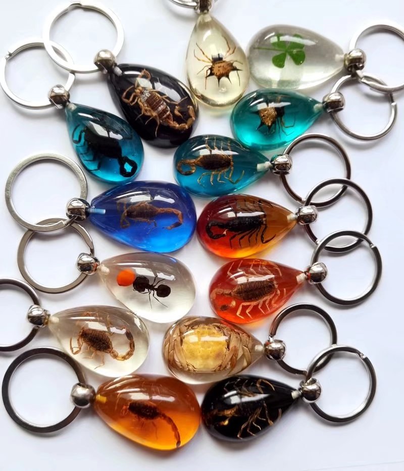 

15 pcs real scorpion spider crab ant four leaf clover drop shaped amber resin keychain taxidermy oddity insect encased