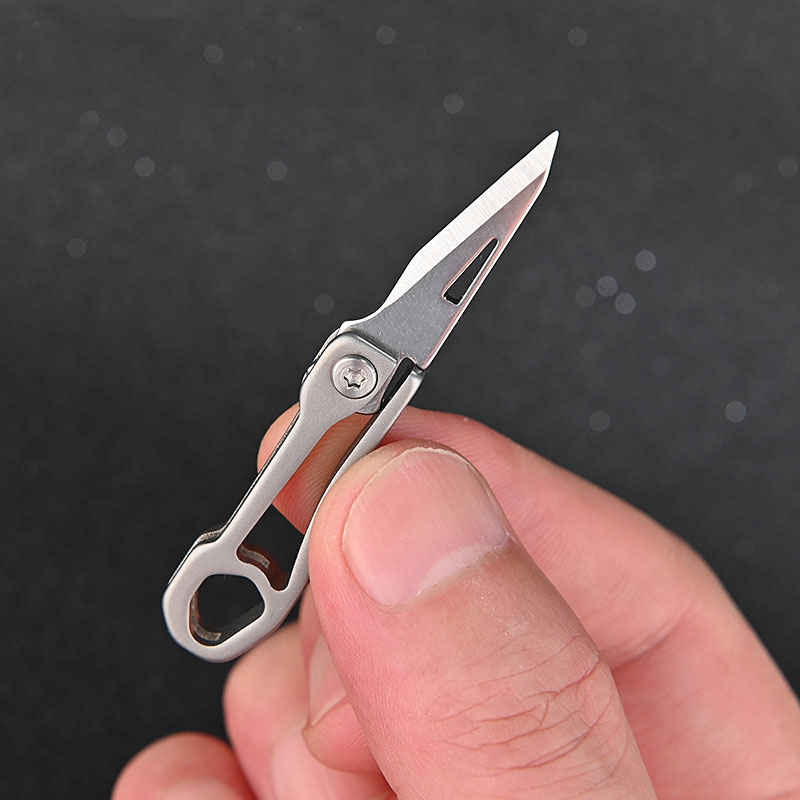 Mini Titanium Alloy keychain Folding Knife Letter Open Paper Cutting Tool Outdoor Pocket Self-defense Key Pendant EDC Cutter-image-710124522