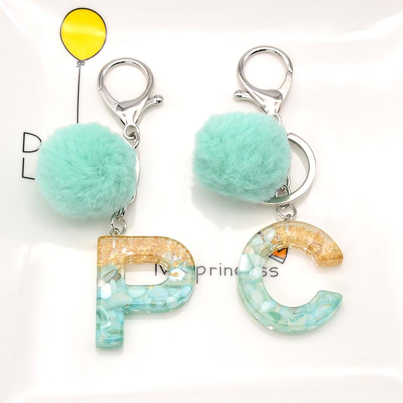 

Keychains Fashion Blue Pompom Letter Keychain Words Keyring With Puffer Ball Glitter Gradient Color Resin Crafts Handbag Charms