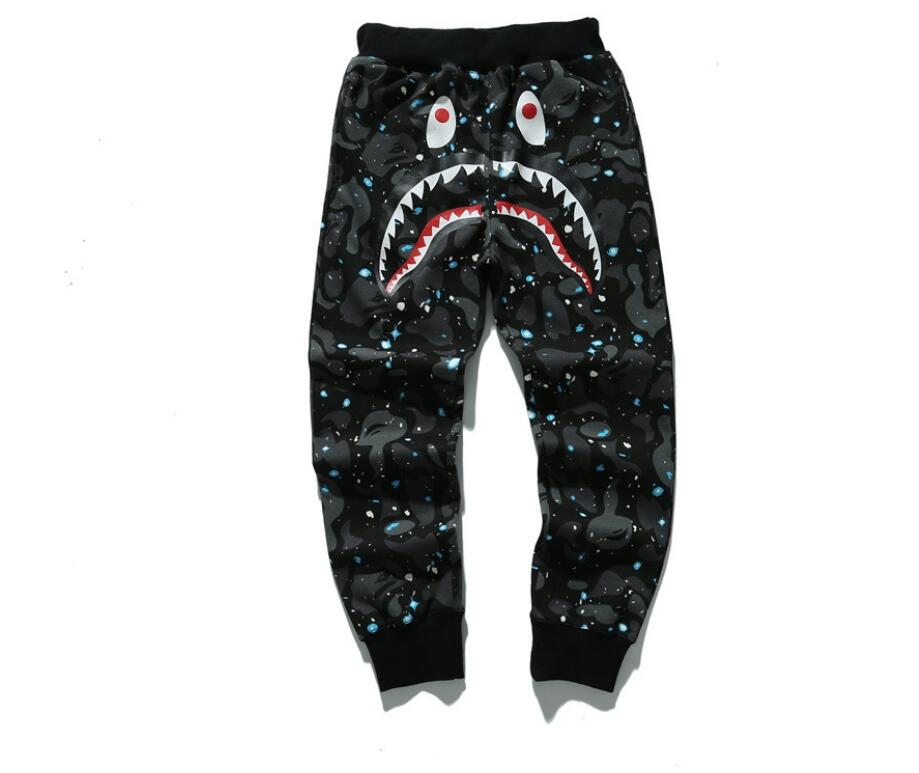 

2021 European and American autumn new men's women's thin shark mouth star night light casual pants pants, Black
