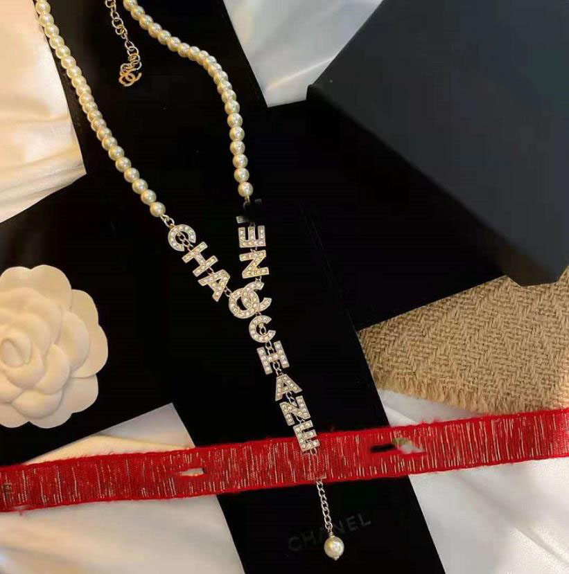 

2021 Pearl Letter Rhinestone Twisted Chain Necklace Brass Material Cross 14K