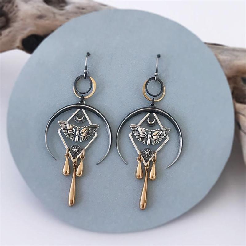 

Dangle & Chandelier Gothic Evil Eye Flying Moth Drop Earrings For Women Steampunk Jewelry Hollow Round Metal Butterfly Earring, Silver