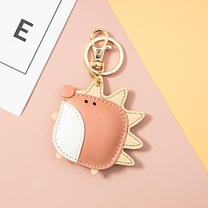 

Keychains Jaeeyin 2021 Fashion Jewelry Genuine Cow Leather Hand Made Pink White Gold Color Vivid Cute Animal Hedgehog Keychain Key Charm