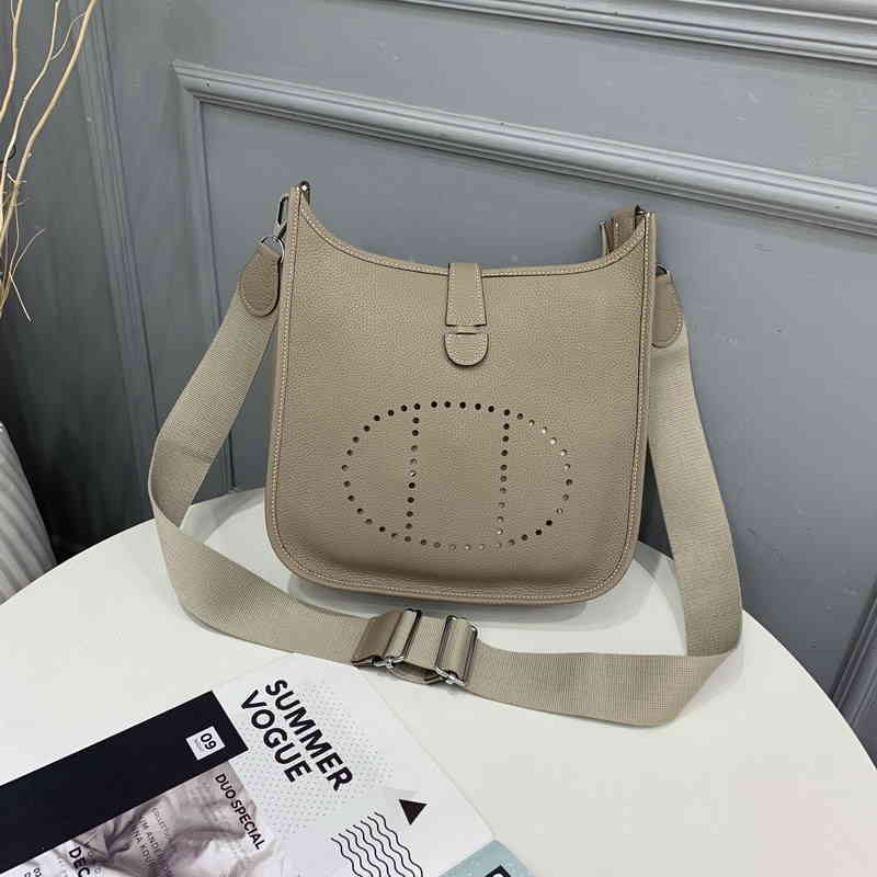 

Autumn and 2021 Winter h Home New Top Layer Cowhide Shrunk Togo Pattern Evelyn Women's Messenger Small Real Leather Bag