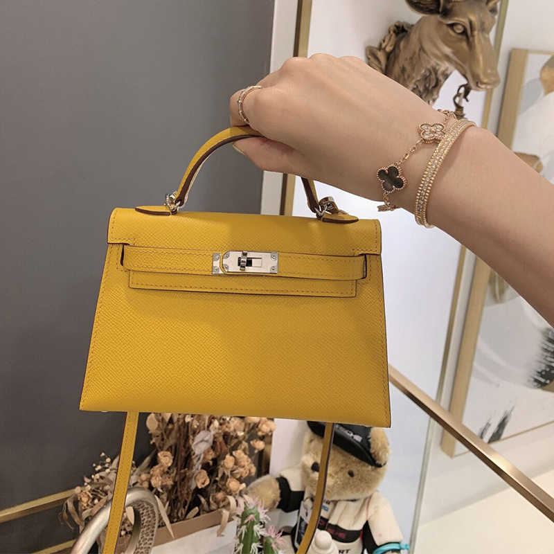 

Designer Bags New Fashion Second Generation Cowhide Women's Bag Kellies Mini Small Single Shoulder Messenger Portable Top Quality Luxurious, Milkshake - gold button - 20cm