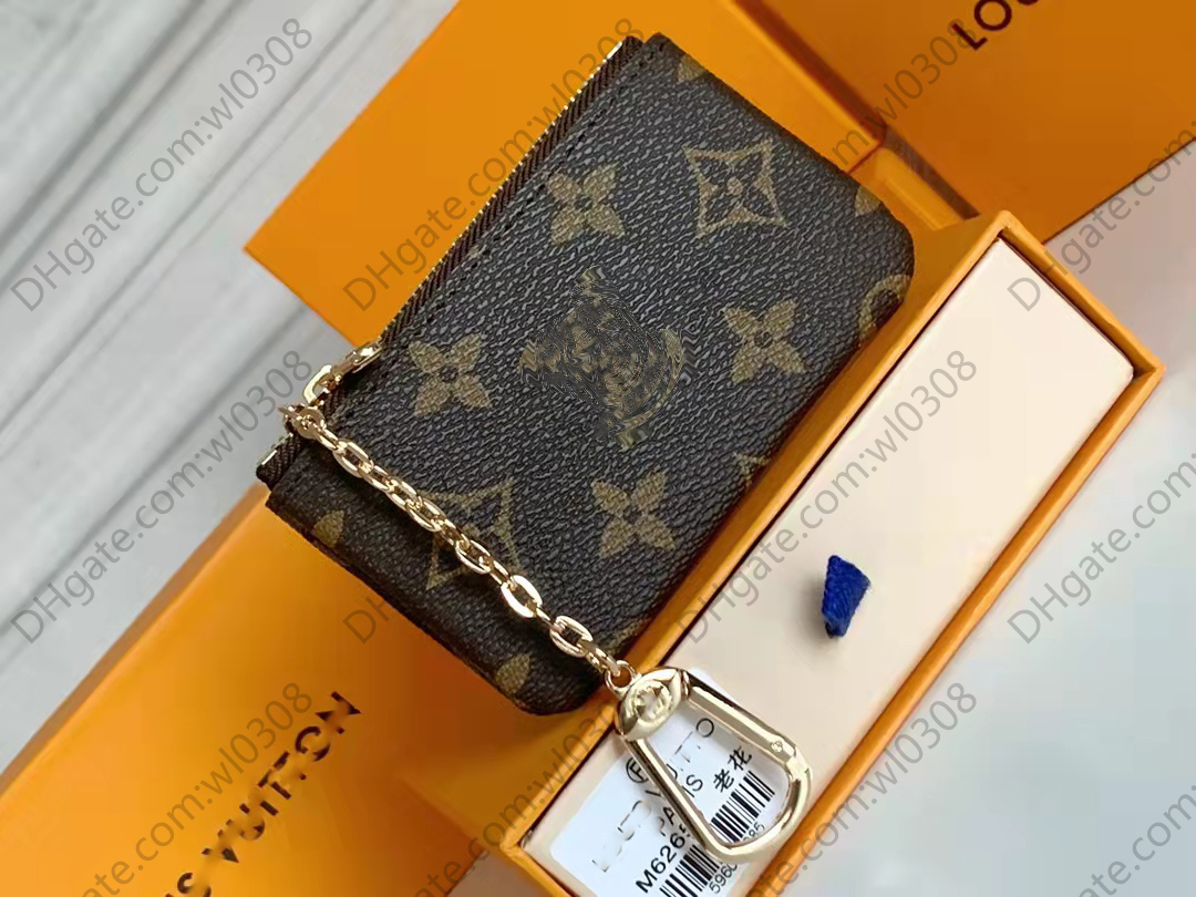 

Top High quality Coin Purses Paris plaid style luxurys designers mens wallet women wallet high-end S luxurys designers Mini Coin Purses With packaging BOX M62650, G2 black flowers