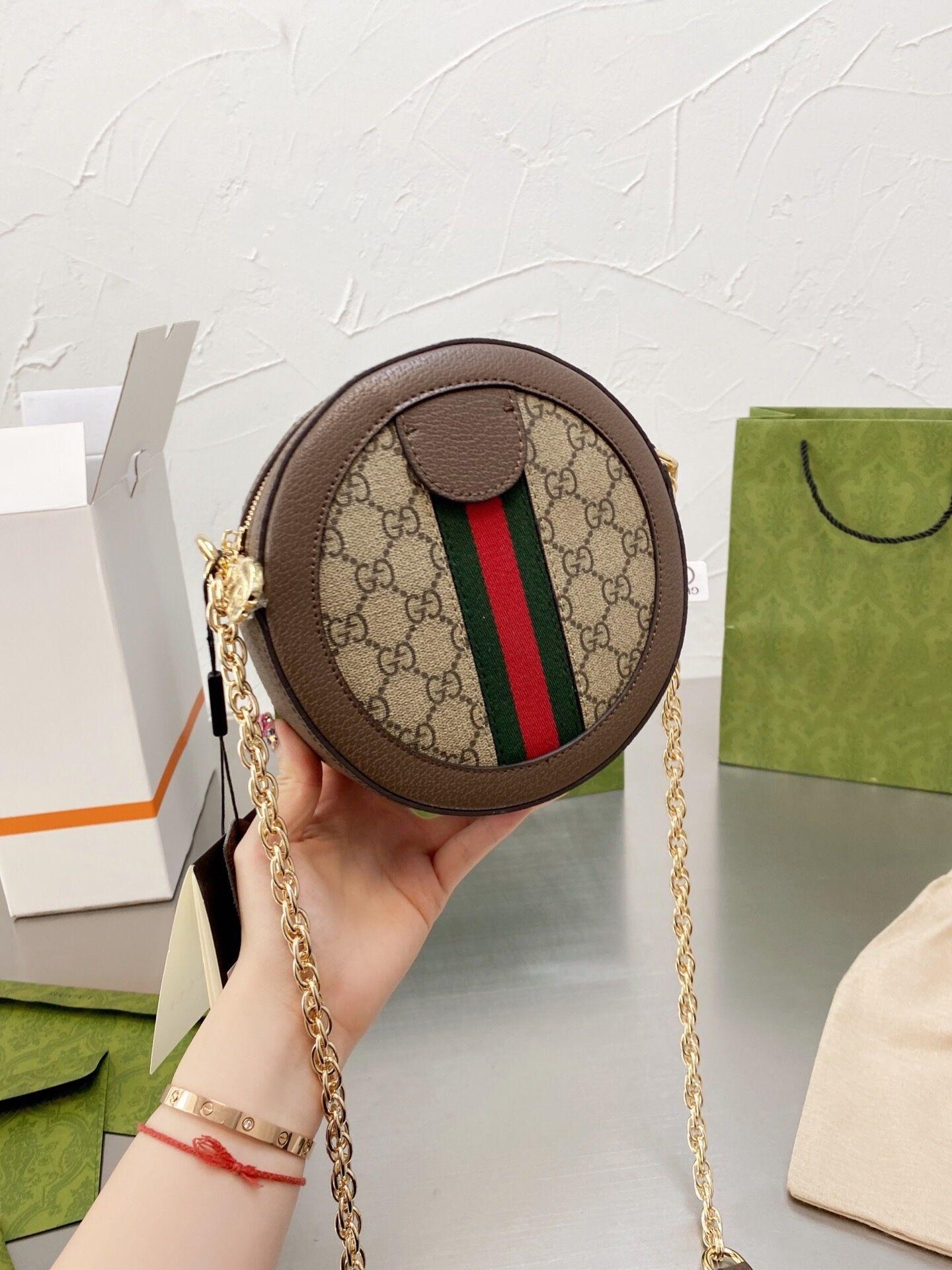 

Design a stylish round cake bag with printed canvas patchwork chain and all-match one-shoulder slung retro mini bags for women