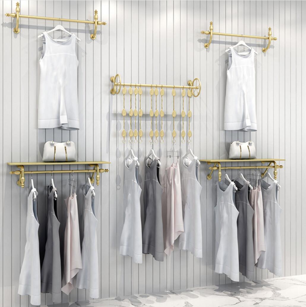 The display rack of clothing store hangs Commercial Furniture children's cloth hang wall hanging clothes racks mall is shelf swith gold side-image-737132933