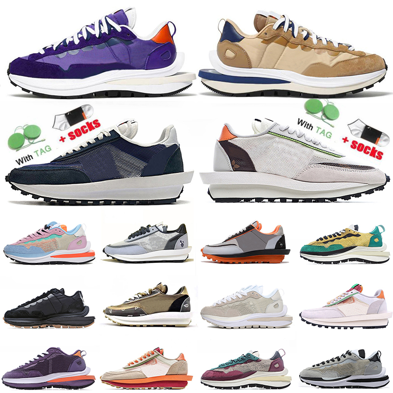 

Nlke Vaporwaffle Running Shoes Sacais Waffle Womens Mens Trainers Sesame Blue Void Dark Iris Dio White OFF Sail Black Gum Luxurys Designers Sneakers