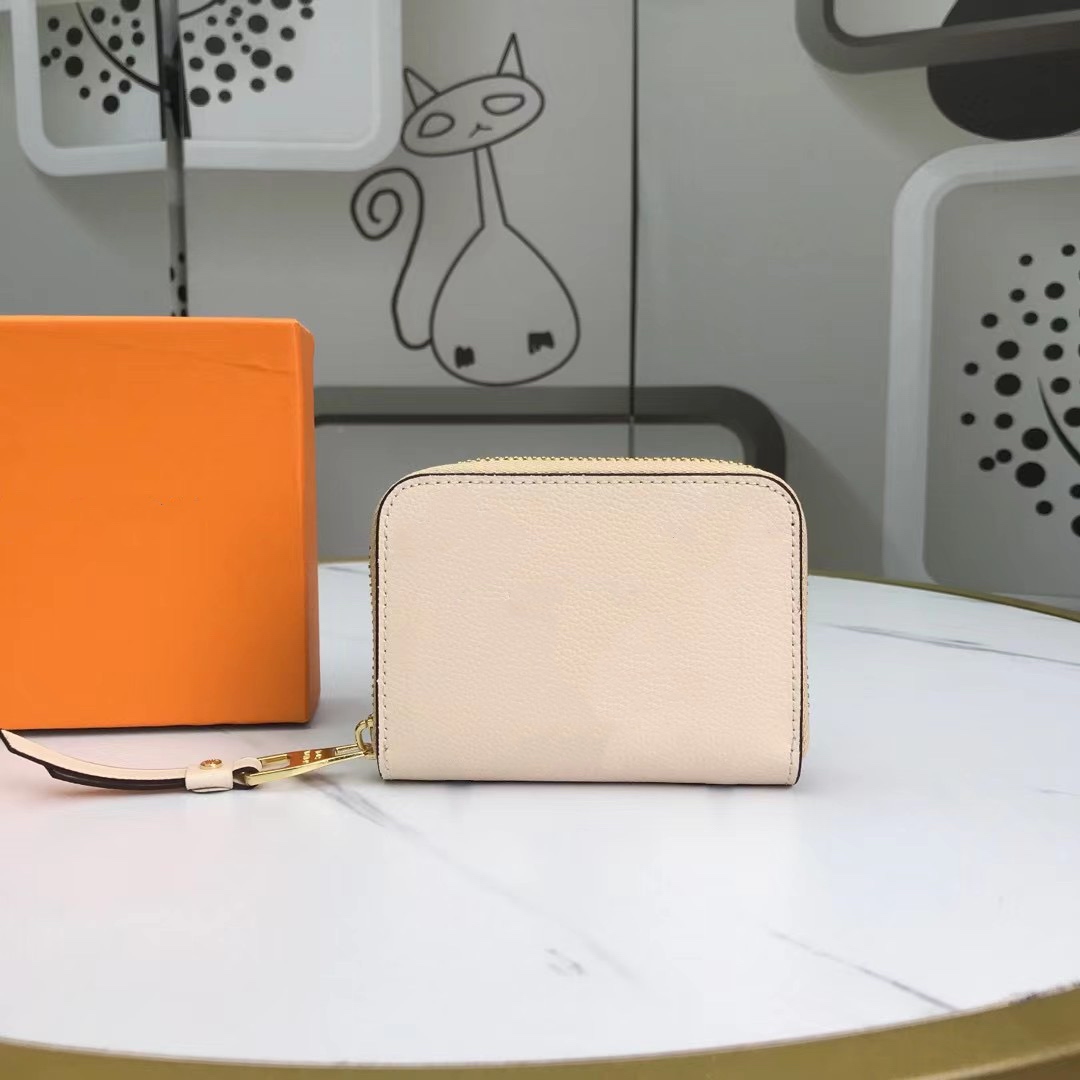 

Classic Zipper Pocket Victorine Coin Purse Wallet Empreinte Leather in Blue Small Cowhide Goods M80408 Lvlouis, Ivory