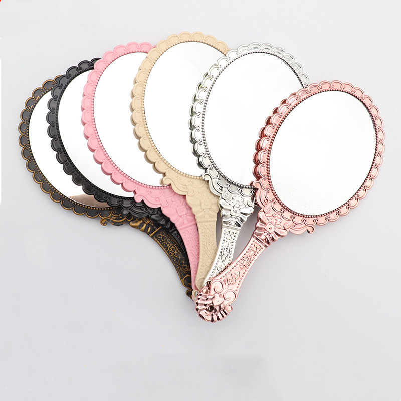 

Ladies Vintage Repousse Floral Hand Held Oval Mirrors Household Sundries Makeup Dresser Romantic Lace Hand-held Mirror Bronze Silver Gold Pink Cosmetic Tool ZYC49
