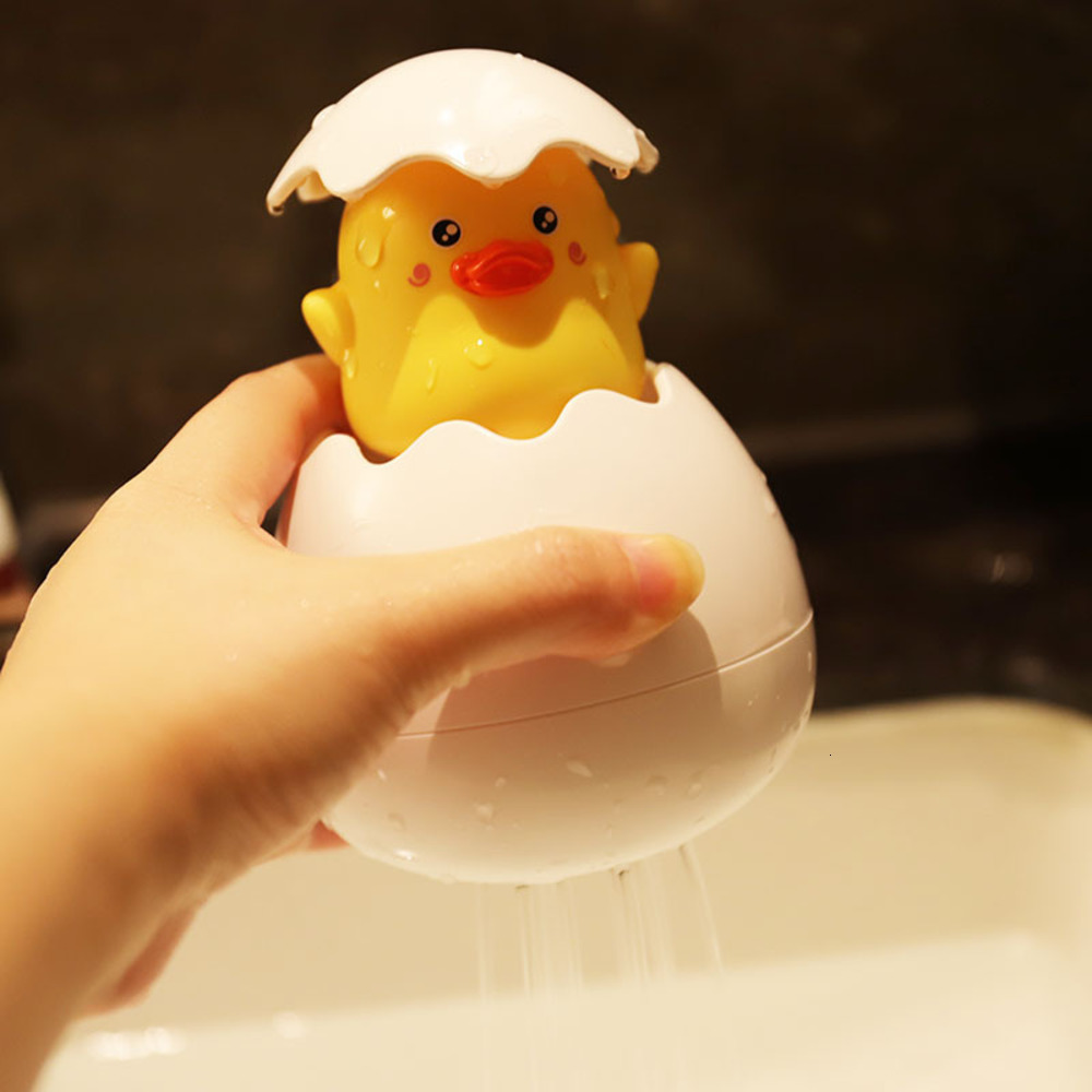 

Children's bathing toy baby fun floating water sprinkling duck egg Penguin