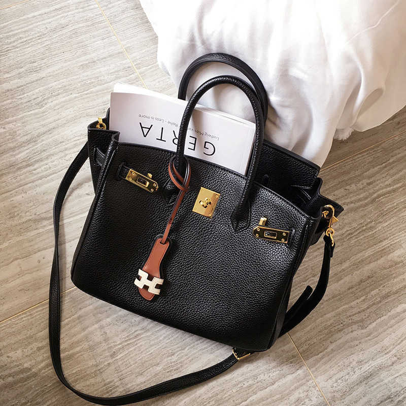 

Bag women's large capacity Single Shoulder Messenger 2020 new tide litchi pattern bag high sense atmospheric small handbag, 20cm black