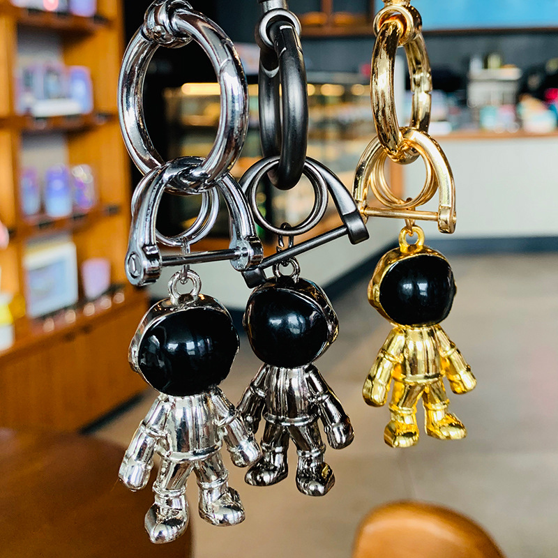 

Astronaut Charm Spaceman Commemorative Museum Keychain Personality Metal Bag Decorate Leather Key Chain for Women Gift