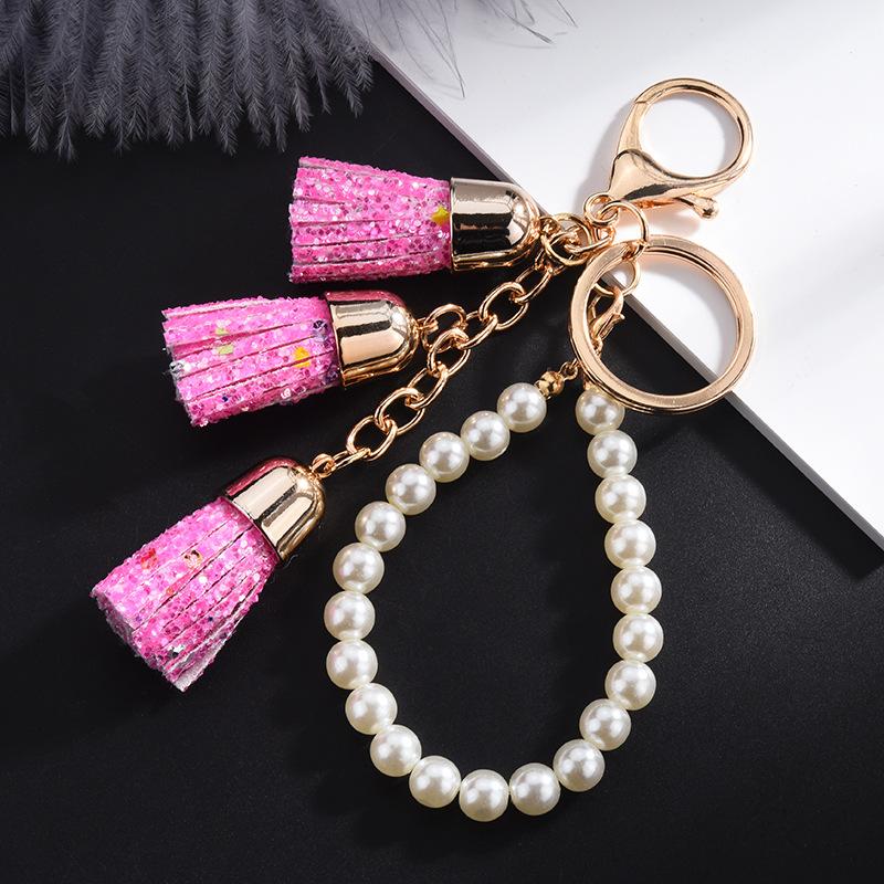 

Keychains 2021 Female Fashion Car Keychain Gold Candy Sparkles Tassel Key Chain Pearl Pendant For Party Gift