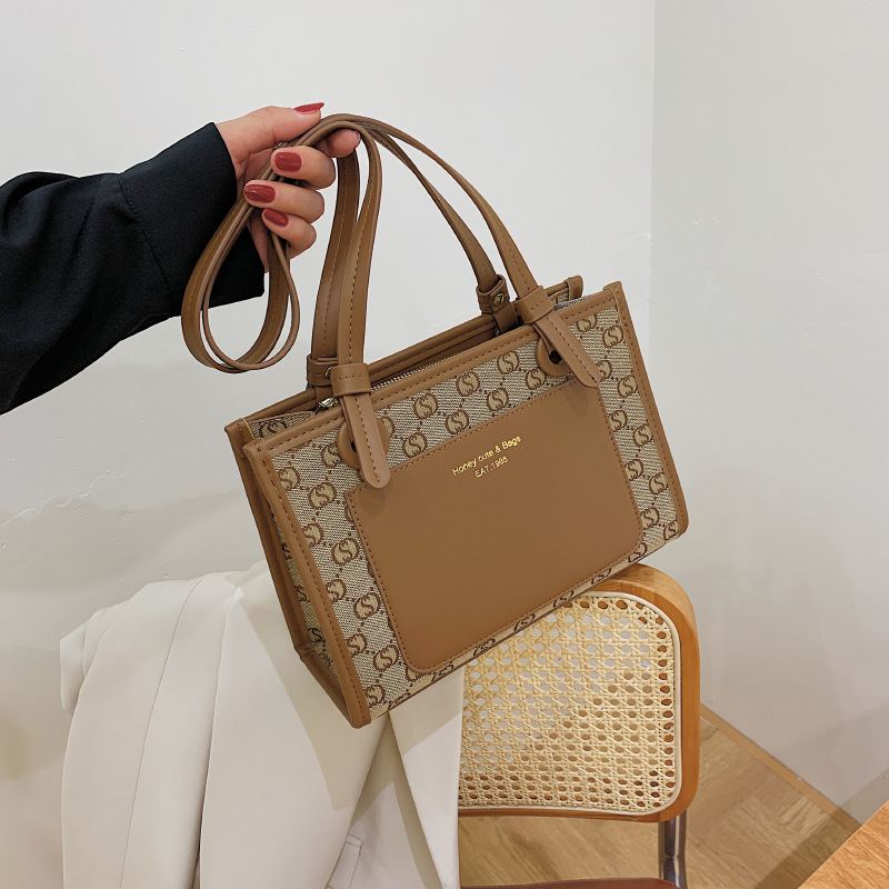 

Cheap Outlet Online 70% Off Sale Popular bag women 2021 new fashion letter one shoulder armpit texture women's hand tote, White