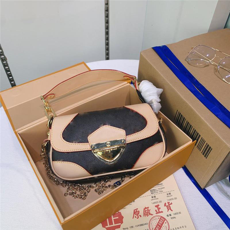 

2021 Marilyn Brown Color Pink Gold Chain Shoulder Bag Size: 15*8*25CM V-142