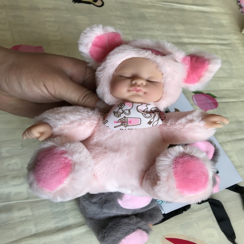 

The doll for baby sitting height 25cm