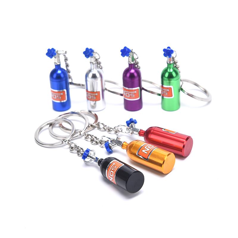 

Keychains Car Turbo NOS Keychain Nitrogen Bottle Metal Key Chain Ring Stash Box Storage