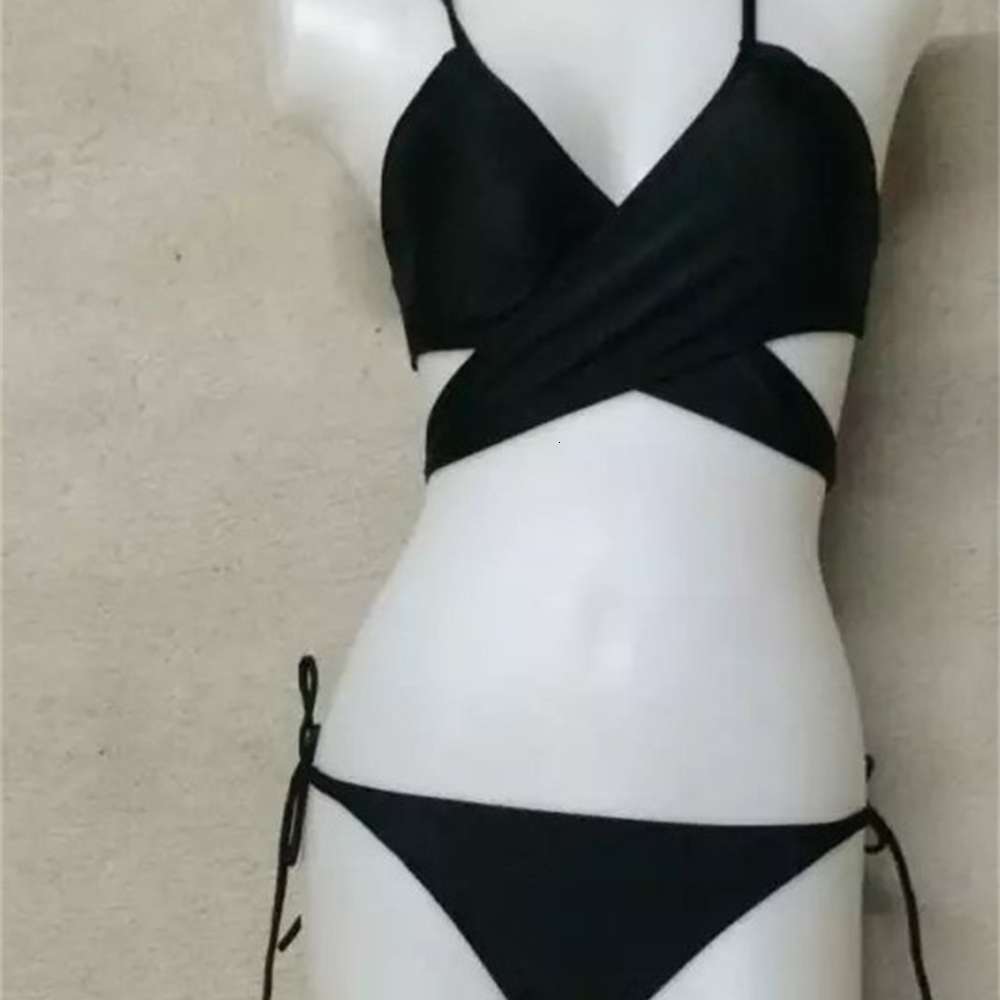 Pure Black Bikini Women&#039;s Swimsuit Sexy Split Cross Lace triangl swimwear-image-692540842