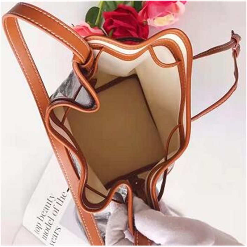 

Unique wood handle small tote bag. Leather good quality Retro saigon totes , Mini women GOYA handbag. Drawstring Bucket Bags. 2 different style BOX