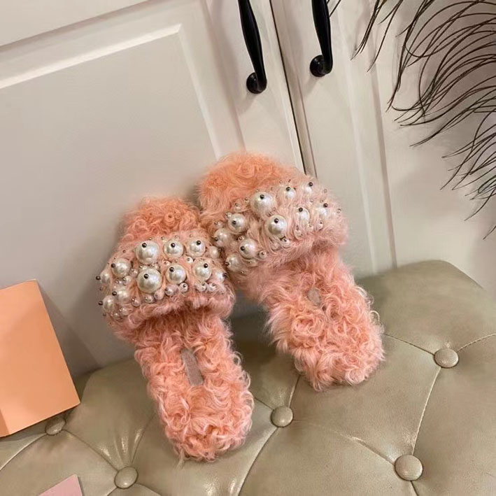 

Classic lamb wool slippers, upper with hand sewn black and white pearl, leather sole, standard size 35-40, Pink