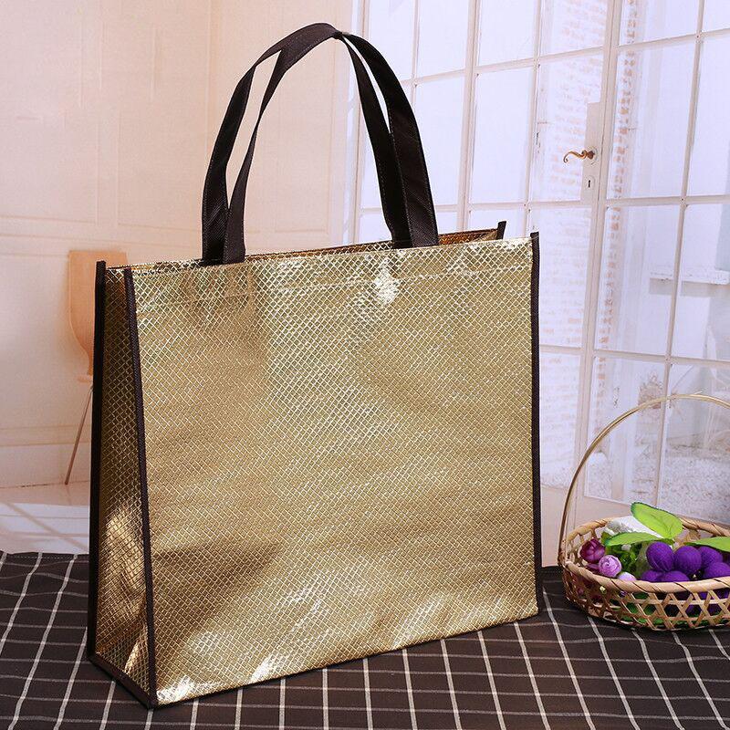 

Shopping Bags 500pcs/lot H34xW40xD12cm Custom PP Reusable Shiny Lamination Non Woven Promotion For Clothes,shoes Packing, Silver