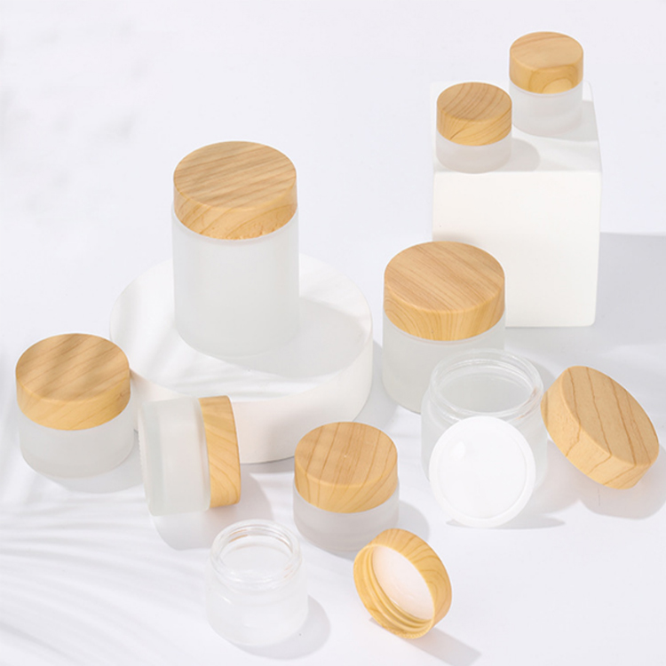 

luxury Face Eye Cream Bottle Frosted Glass Cosmetic Jar 5ml 10ml 15ml 30ml 50ml 100ml Skincare Storage Packaging with Wood Grain Cap