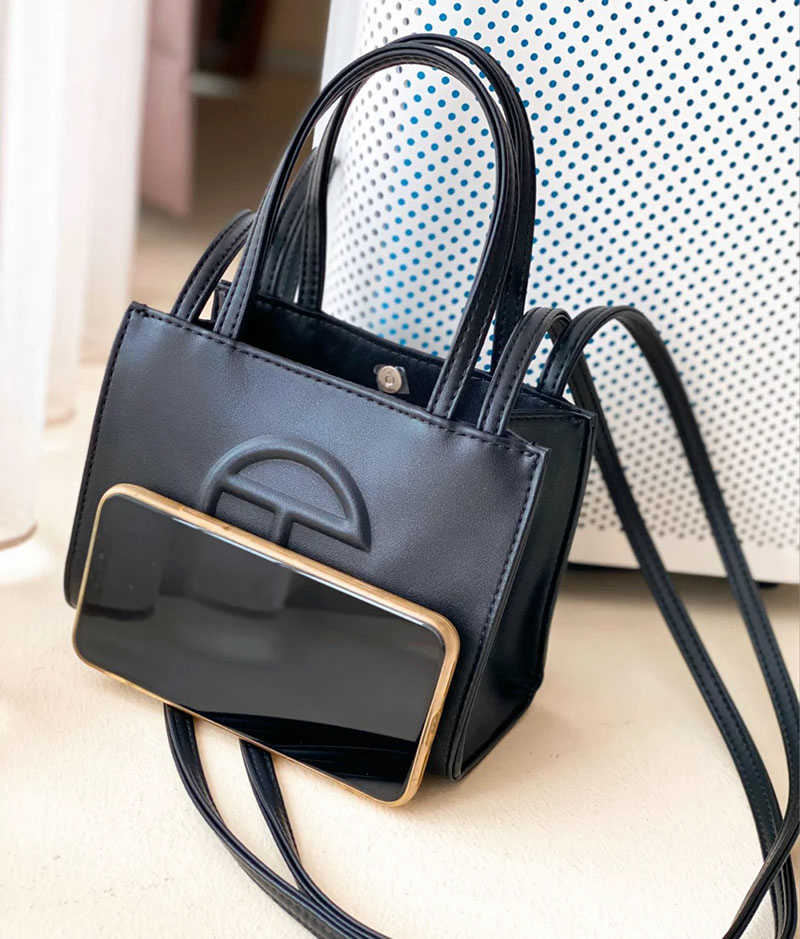 

Telfar America's new one-shoulder-carry square niche slant camera Tote bag onUK, The small black