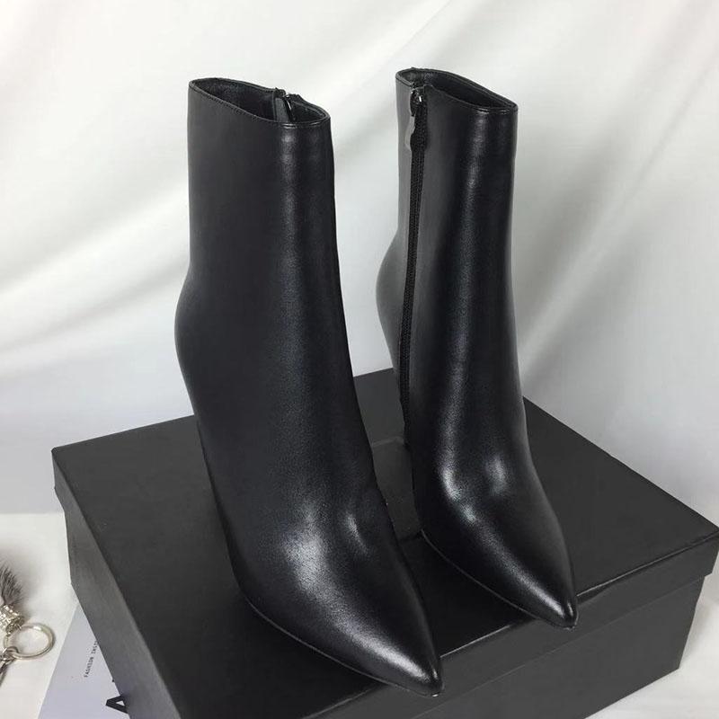 

The high quality designer black letter spike Ankle Boots mid-calf women